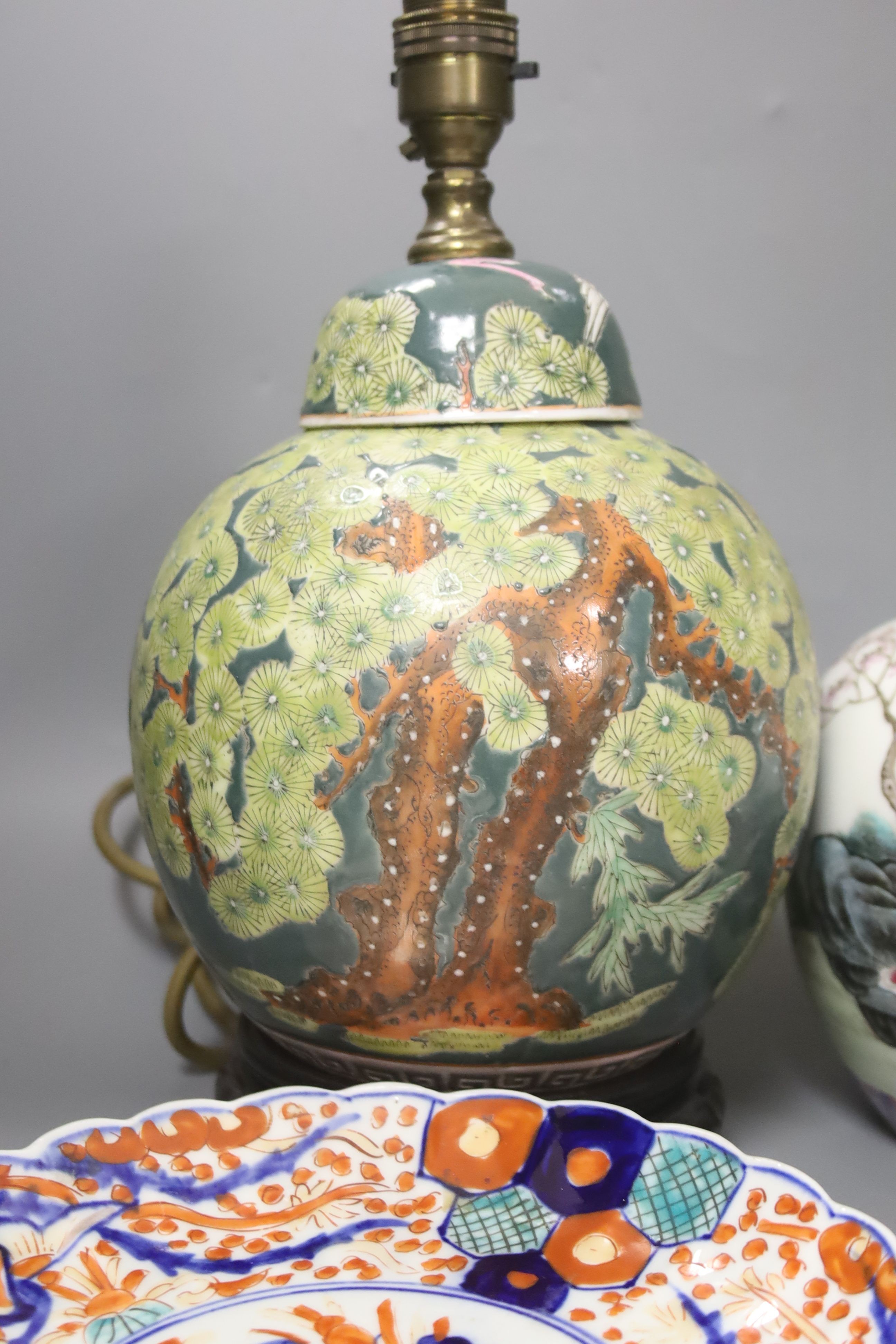 Two Chinese export blue and white plates, two ginger jars, a crackle ware vase and a lamp